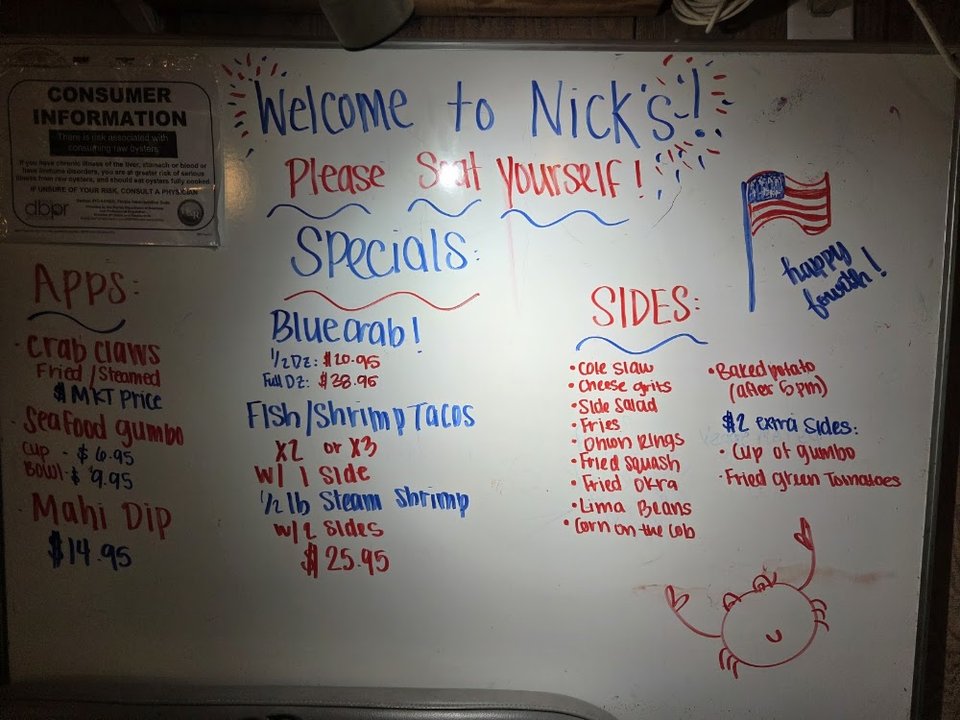Menu items featuring crab, shrimp, and fish.